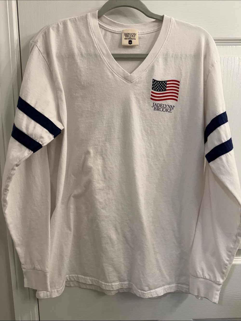Jadelynn Brooke Women’s White Long-Sleeve V-Neck Shirt with Flag